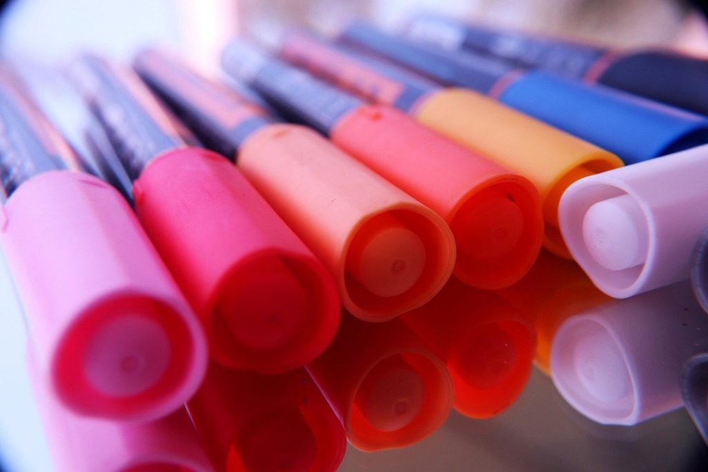 brightly colored markers close up