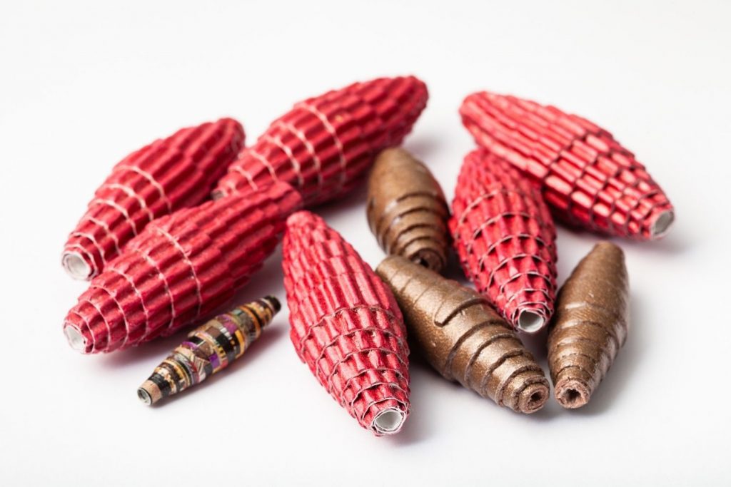 Red and metallic rolled paper beads 