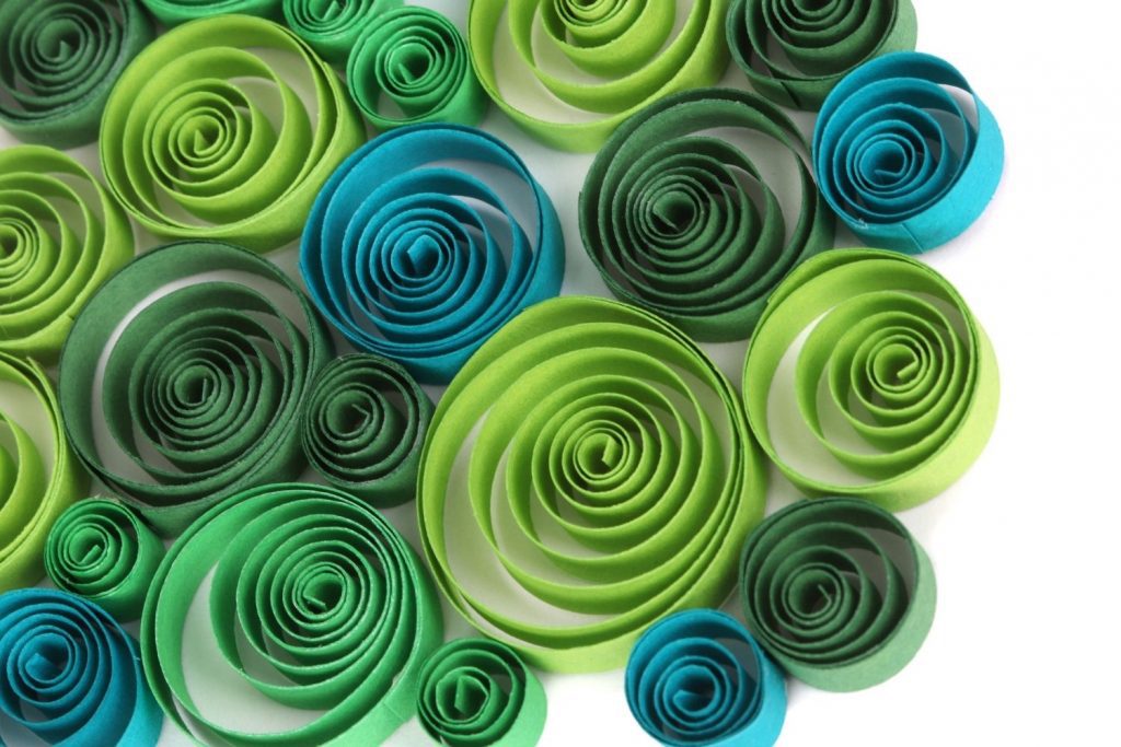 blue and green paper quilled into spirals