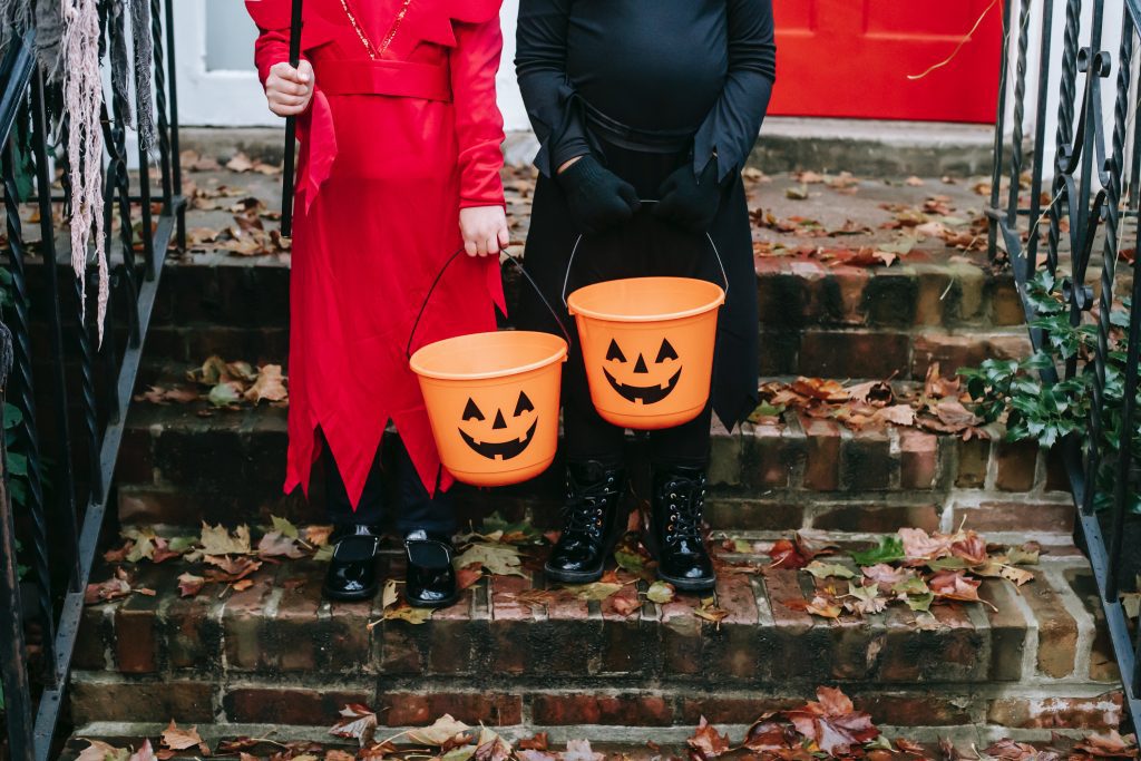 trick or treaters standing on steps