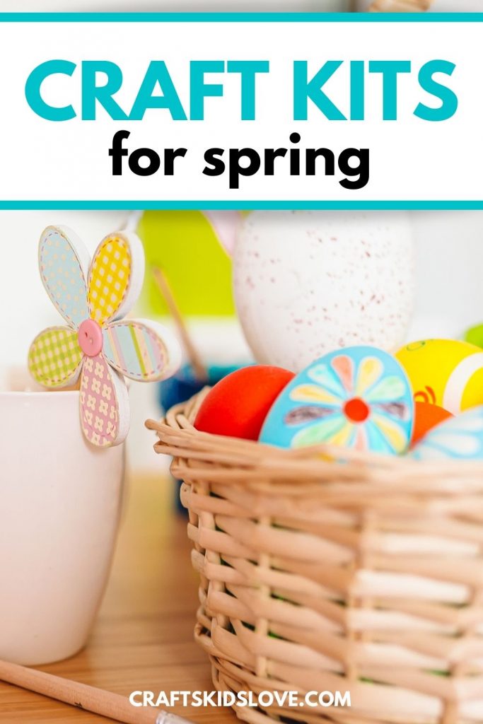 craft supplies with paper flower and eggs